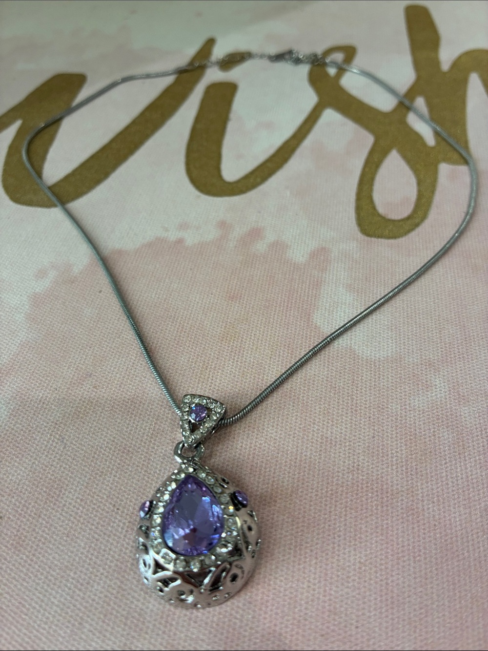 Elegant Silver Necklace with Purple Teardrop Pendant